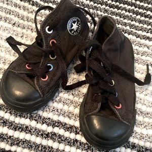 Toddler black converse high-tops with unique colored eyelets - Size 7